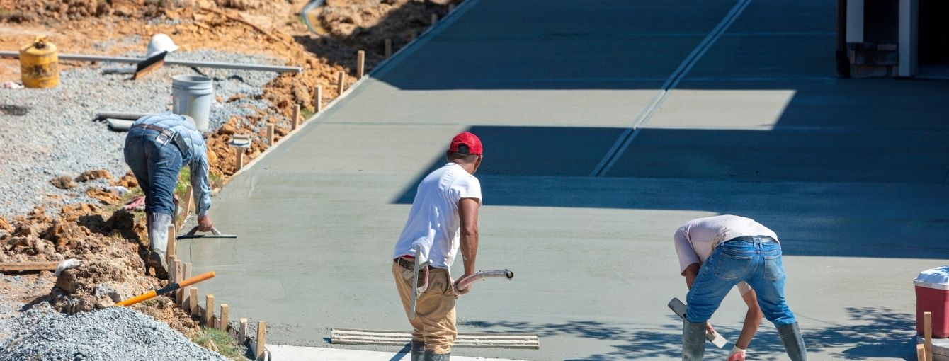Concrete installers working on a residential house. 