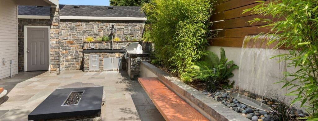 A gorgeous backyard that has been hardscaped.